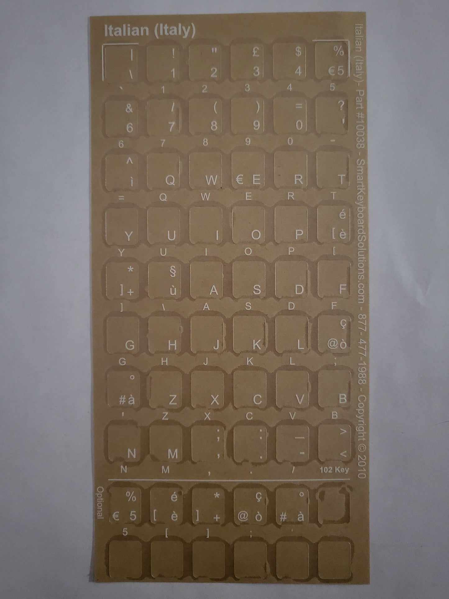 Clear keyboard label sheet with cutout letters for Italian (Italy) keyboard keys