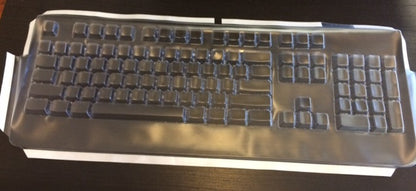 Clear keyboard cover with cutouts and raised key outlines