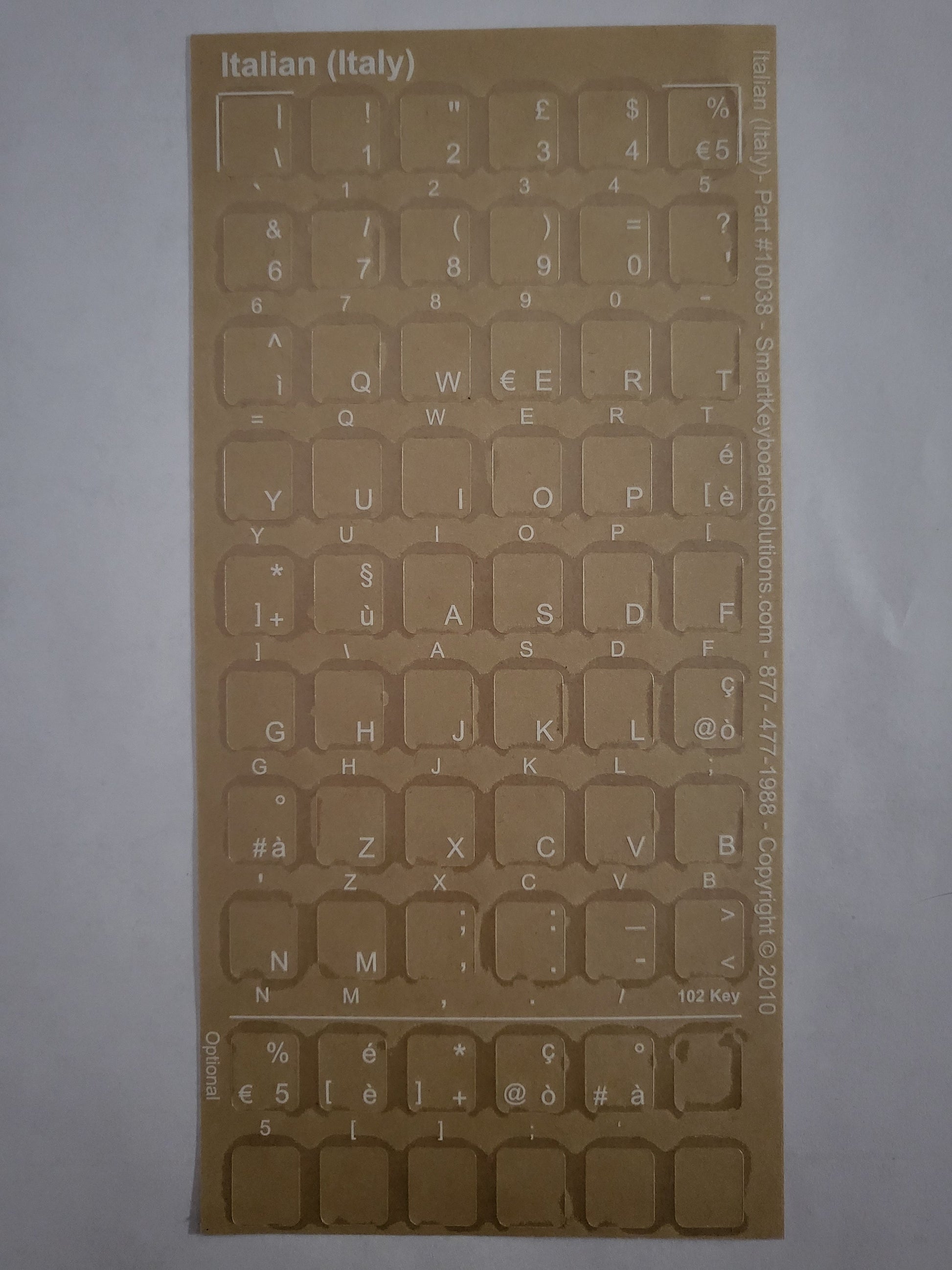 Clear keyboard label sheet with cutout letters for Italian (Italy) keyboard keys